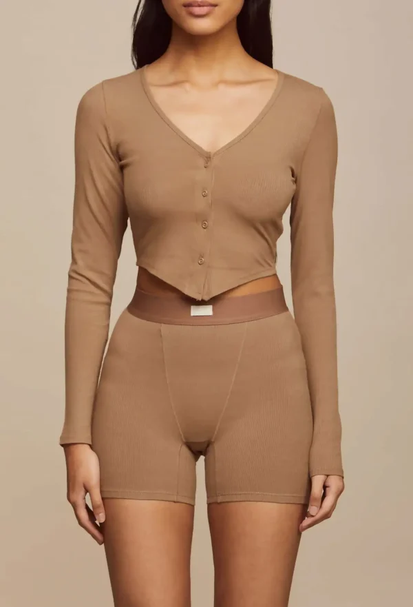 Woman wearing Shiitake Flaxseed for Everyone-Freedom Flow button-front cardigan with matching bike shorts