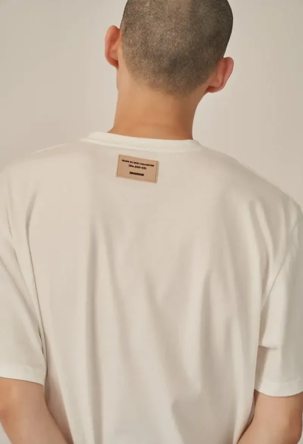 Back view of man wearing white recycled pet t-shirt
