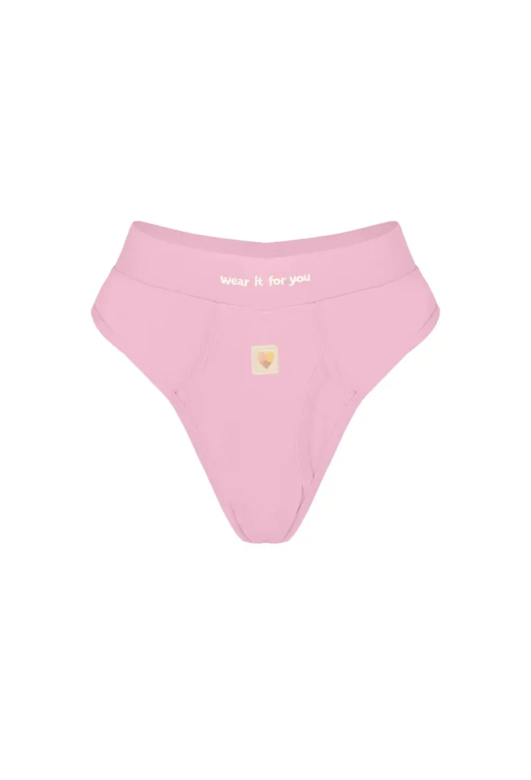 Mumm X JW You're gorgeous collection in pink high-waisted bottoms with "Wear it for you" text and decorative logo detail