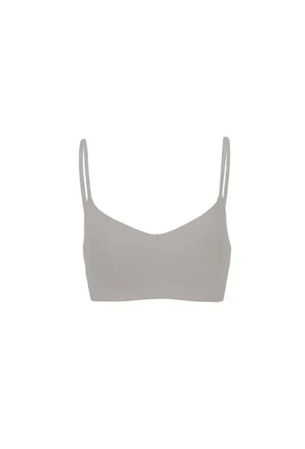 Product shot of chill vibe bra top in white featuring minimalist bralette style and comfortable construction