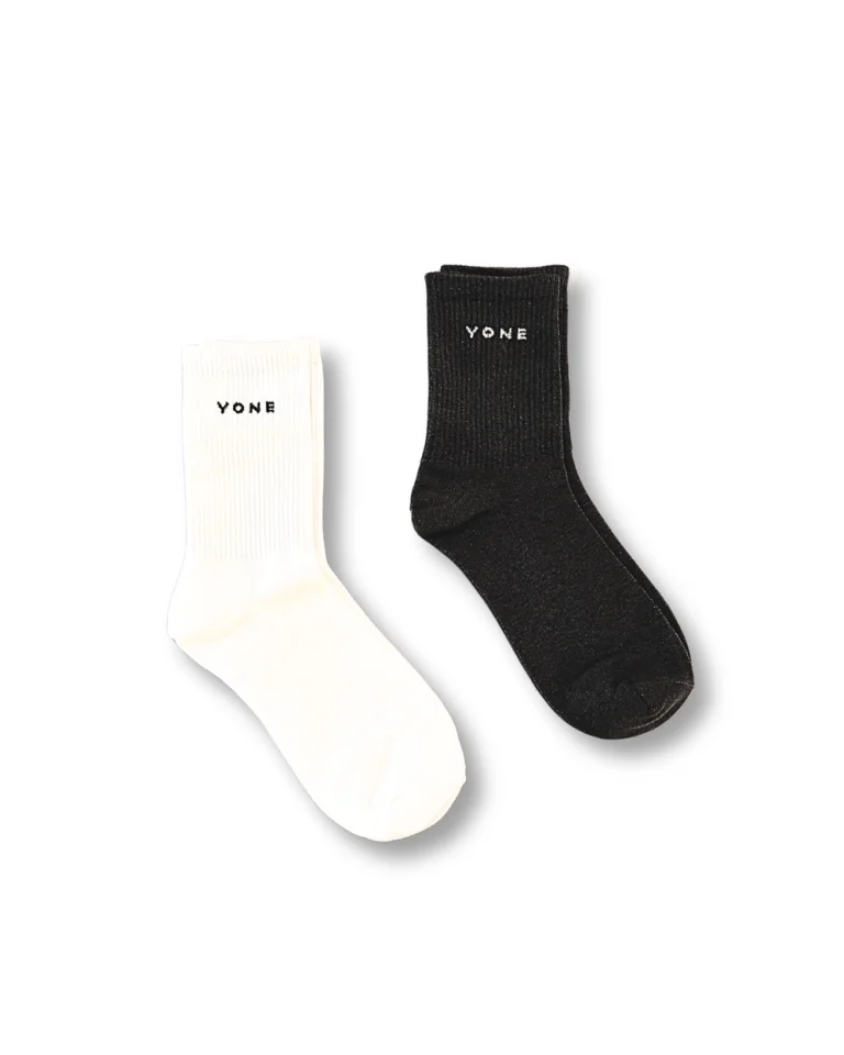 Yone Crew Socks, featuring a distinct logo and comes in 2 versatile colors: Coconut and Charcoal